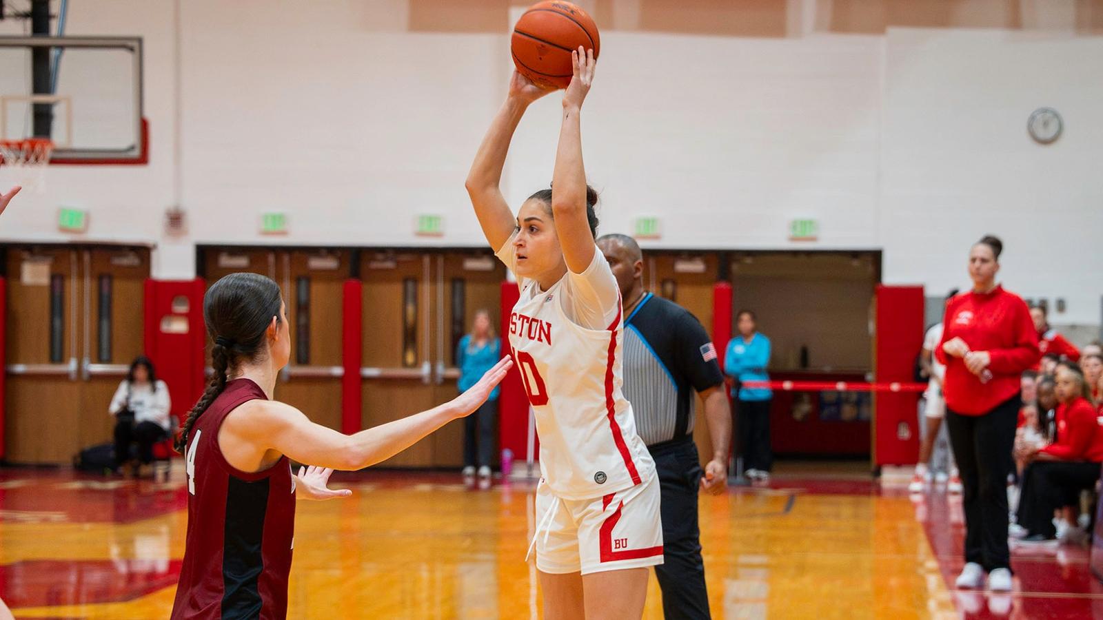 Photo of BU women's basketball senior Anastasiia Semenova catching a pass at Case Gym.