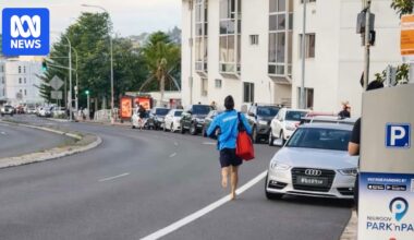 Bondi lifeguard pictured running barefoot in viral photo recalls night of terror attack
