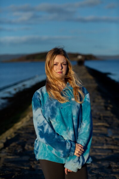 Caitlin Turner, a marine biologist, poses for a portrait on Nov. 17, 2025, in Cramond Village, Scotland. (AP Photo/Emily Whitney)