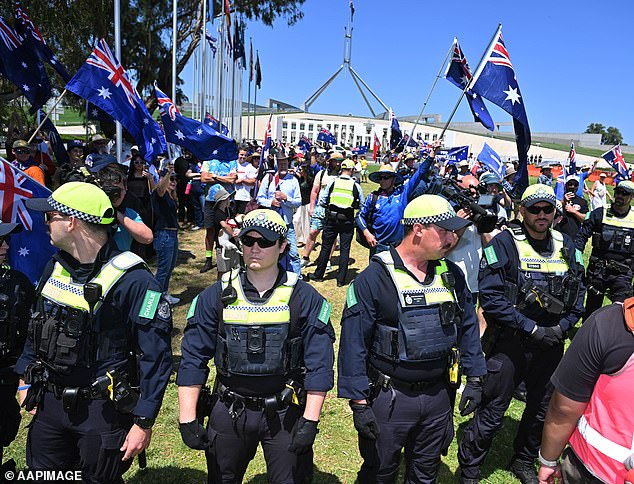 Anti-immigration March For Australia rally outside Parliament House in Canberra, Monday, January 26, 2026. (AAP Image/Mick Tsikas) NO ARCHIVING