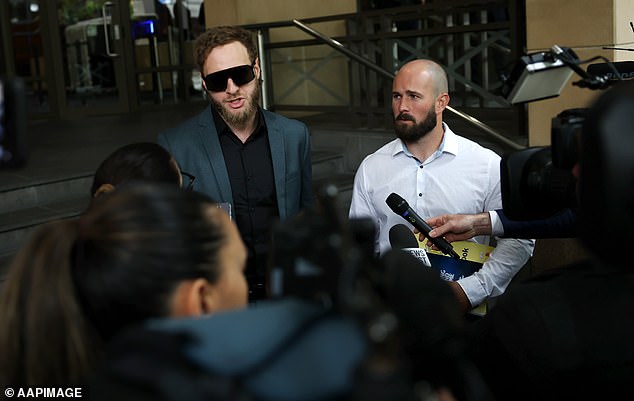 Joel Davis speaks to awaiting media outside the Melbourne Magistrates' Court in Melbourne, Friday, November 8, 2024. Jacob Hersant is set to be sentenced after being found guilty of performing a Nazi salute outside the Victorian County Court in Melbourne. (AAP Image/Con Chronis) NO ARCHIVING