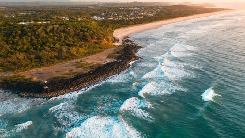 Surfer knocked of board at Angels Beach, Ballina