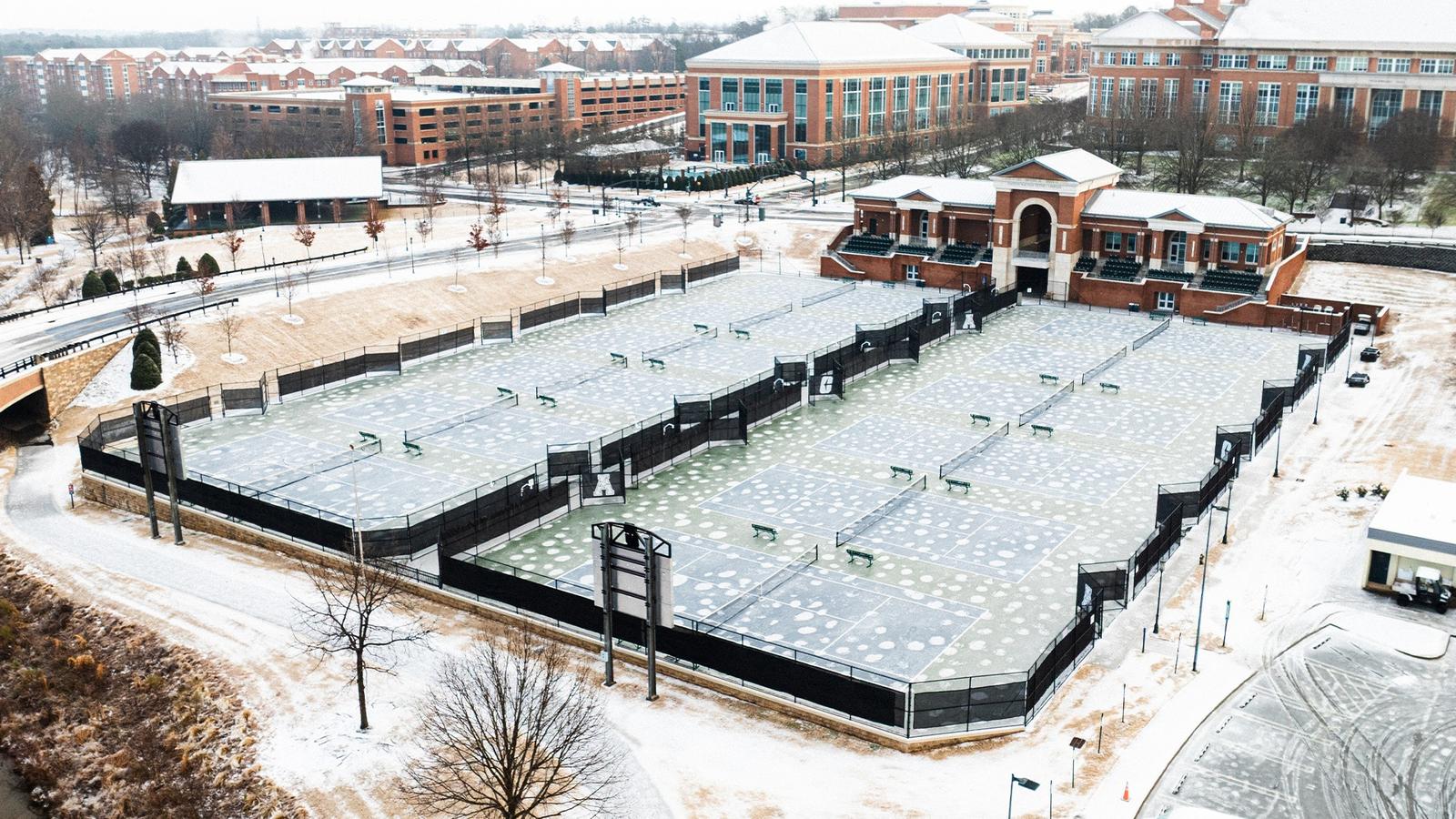Emilio Sanchez celebrates a singles win over Gardner-Webb