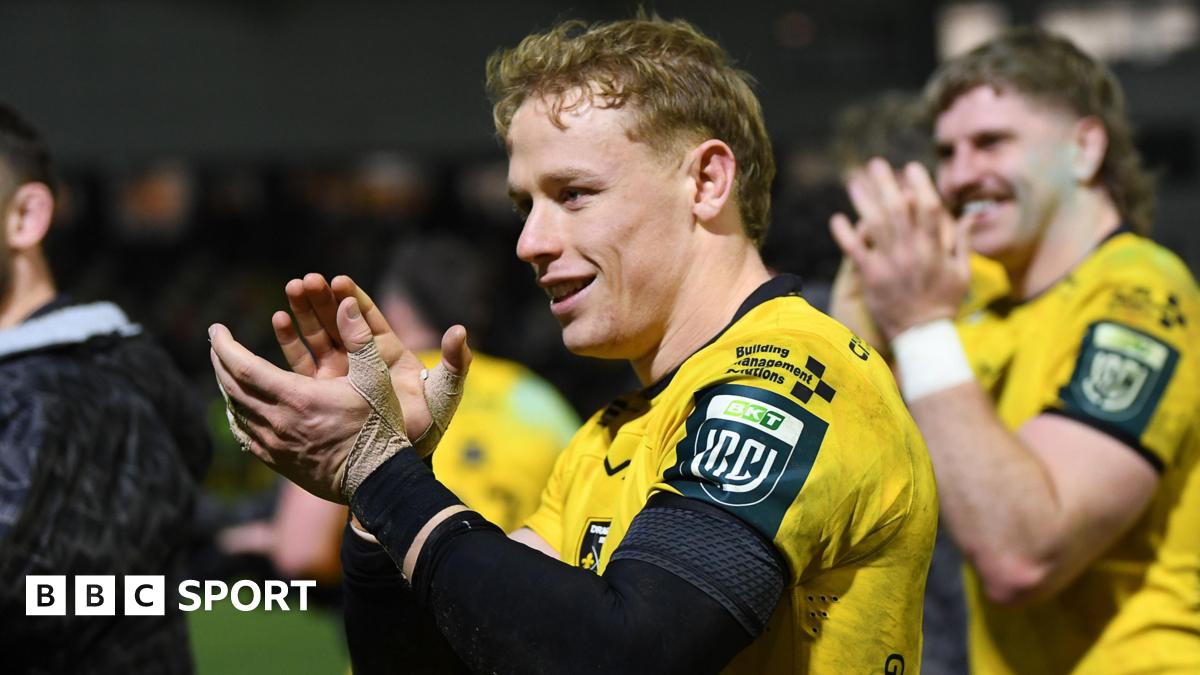 David Richards applauds the Dragons supporters after victory against Scarlets