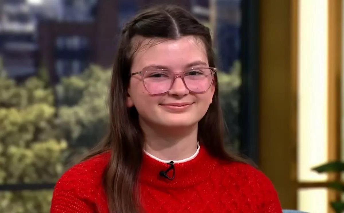 A girl in a red jumper on This Morning