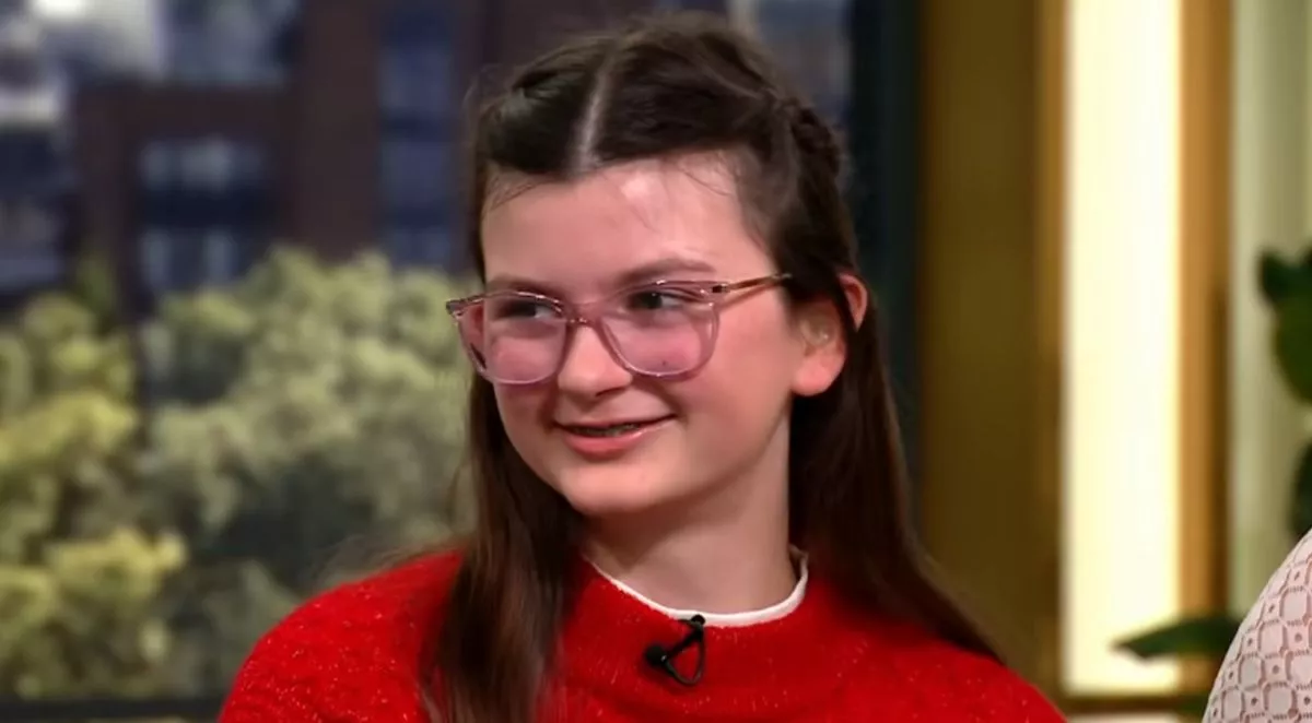 A girl in a red jumper on This Morning