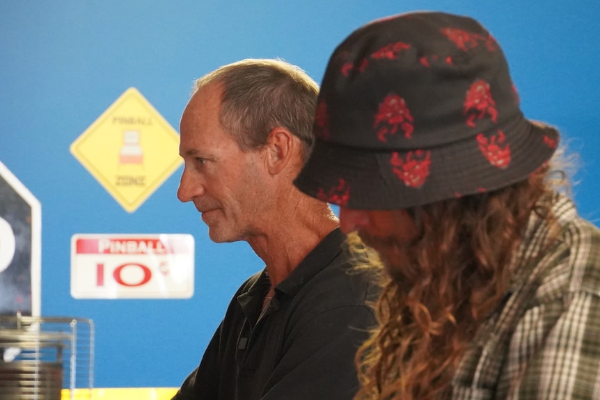 Greg Sharp looks ahead in concentration. 