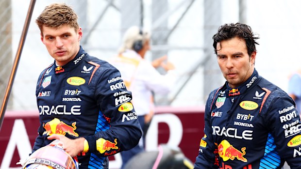 Sixth place Max Verstappen of the Netherlands and Oracle Red Bull Racing and eighth place Sergio Perez of Mexico and Oracle Red Bull Racing, look on in parc ferme  during the F1 Grand Prix of Italy at Autodromo Nazionale Monza on September 01, 2024 in Monza, Italy. (Photo by Mark Thompson/Getty Images)