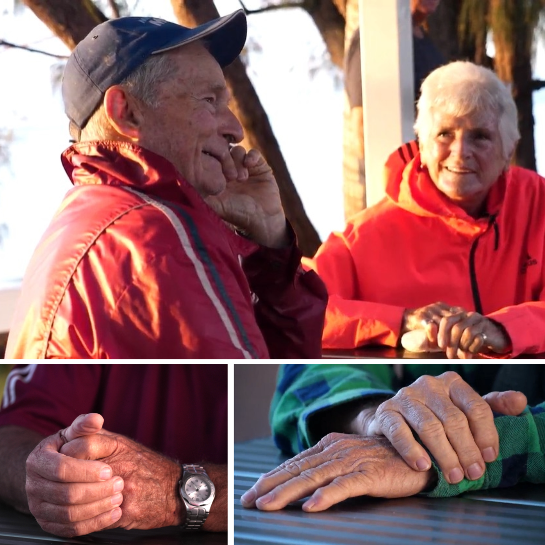 Two people laughing and images of hands on a table.