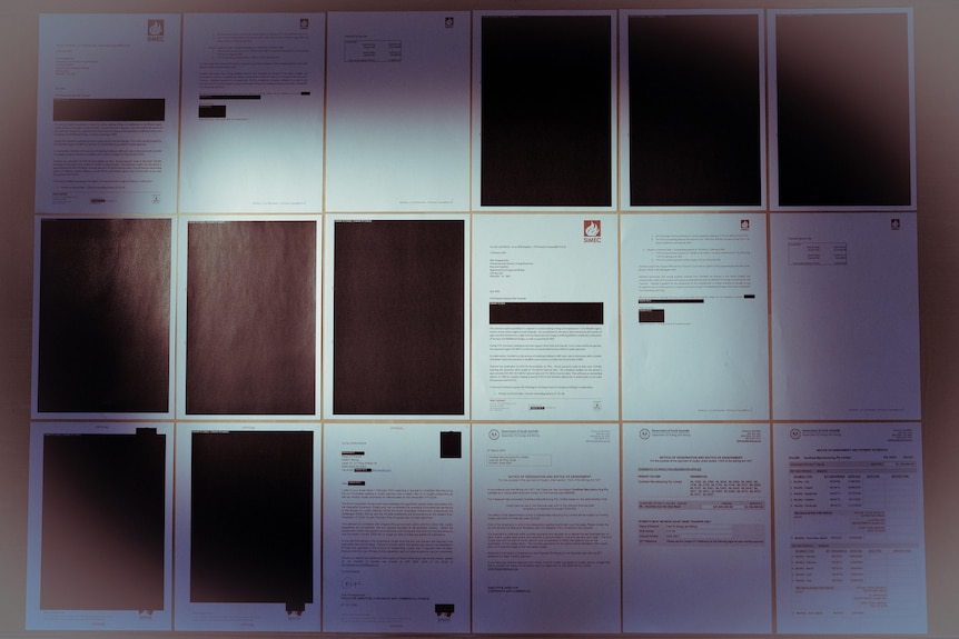 Pages of black redacted portion except four pages of documents