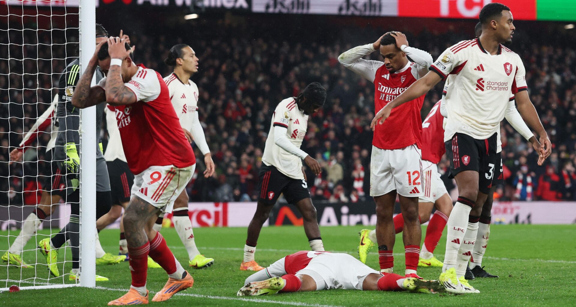 Arsenal miss chance to go eight points clear after Liverpool stalemate