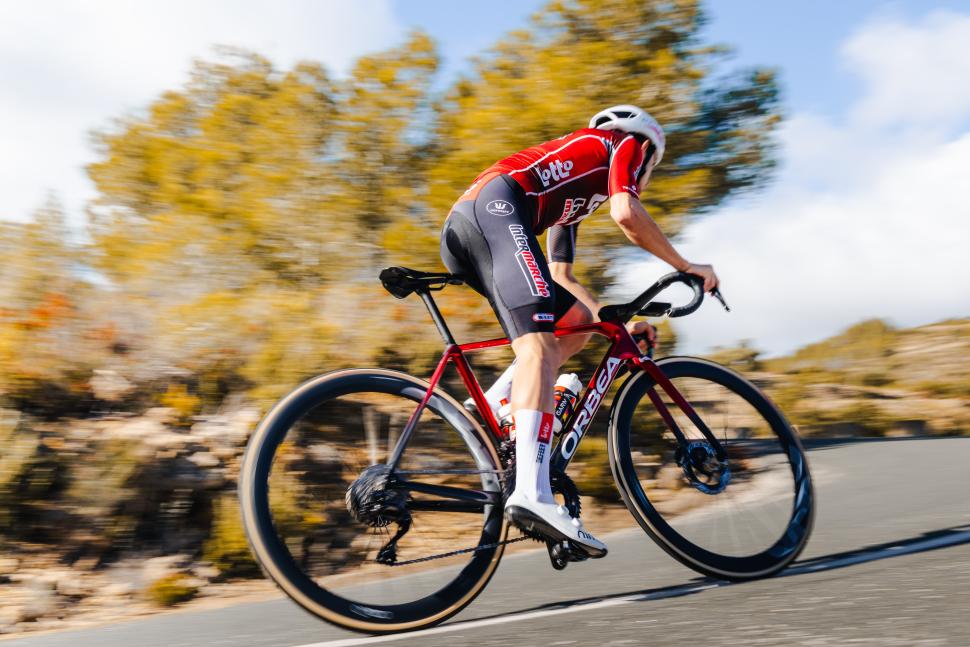 2026 Lotto Intermarche Orbea Orca riding driveside 