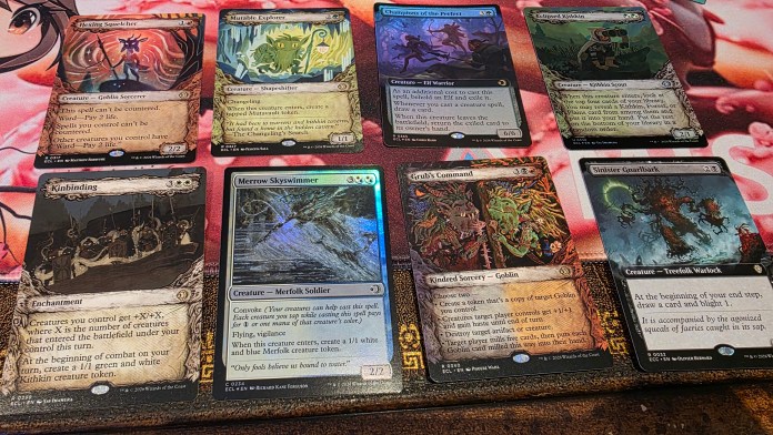 8 magic cards that are varying colours.