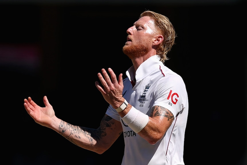 Ben Stokes looks up with his hands outstretched