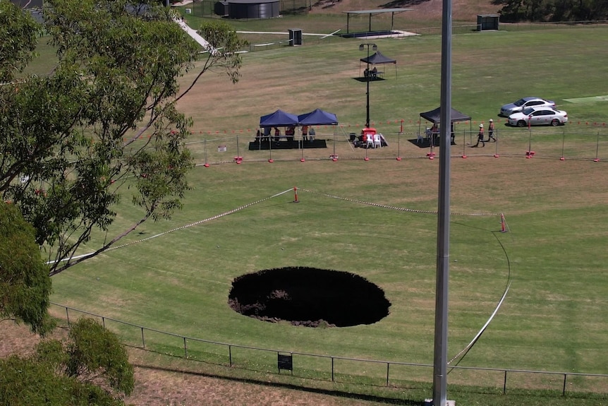 A drone shot of a sinkhole