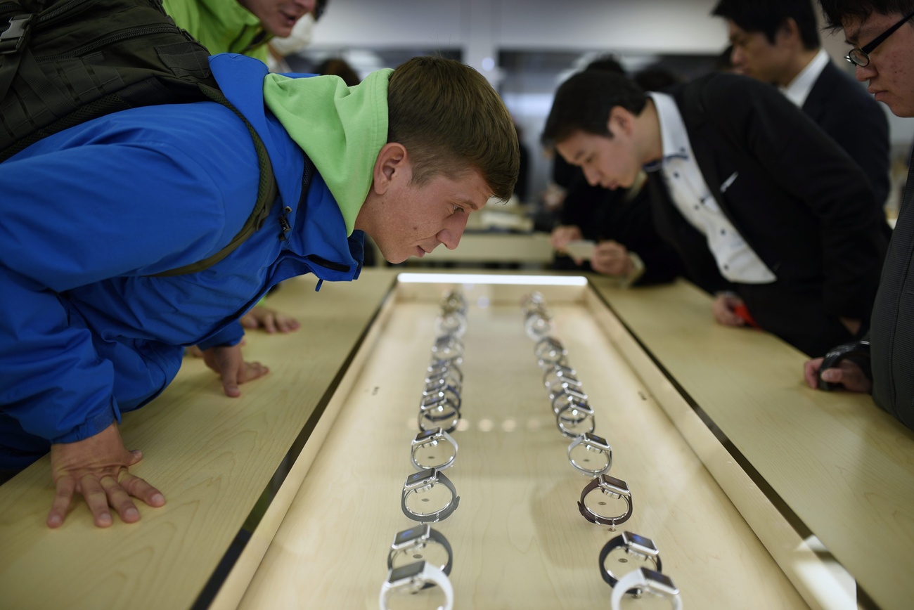 A man looks over the newly launched Apple Watch.