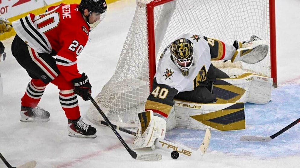 Goaltender Akira Schmid, (number 40) does not allow a goal in this scene