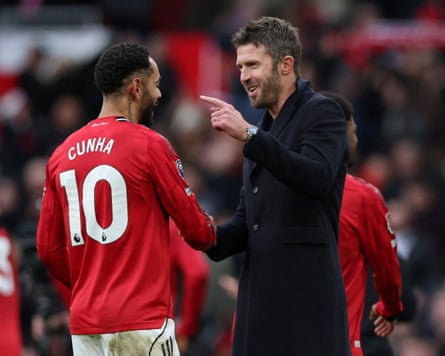 Premier League - Manchester United v Manchester CitySoccer Football - Premier League - Manchester United v Manchester City - Old Trafford, Manchester, Britain - January 17, 2026
Manchester United interim manager Michael Carrick and Matheus Cunha celebrate after the match REUTERS/Phil Noble EDITORIAL USE ONLY. NO USE WITH UNAUTHORIZED AUDIO, VIDEO, DATA, FIXTURE LISTS, CLUB/LEAGUE LOGOS OR 'LIVE' SERVICES. ONLINE IN-MATCH USE LIMITED TO 120 IMAGES, NO VIDEO EMULATION. NO USE IN BETTING, GAMES OR SINGLE CLUB/LEAGUE/PLAYER PUBLICATIONS. PLEASE CONTACT YOUR ACCOUNT REPRESENTATIVE FOR FURTHER DETAILS..     TPX IMAGES OF THE DAY