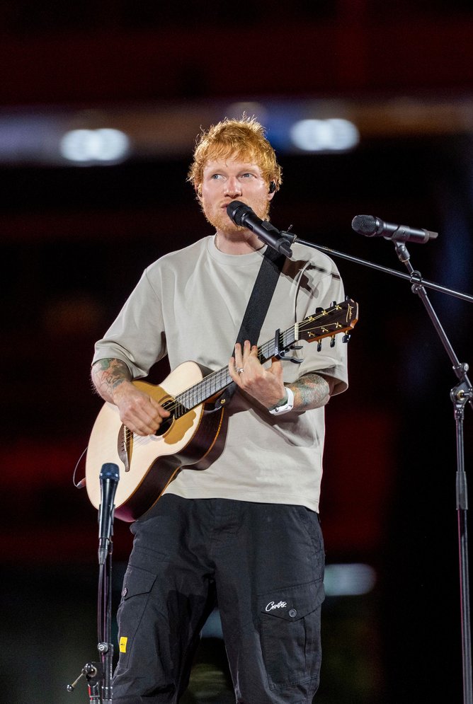 Global superstar Ed Sheeran on stage.