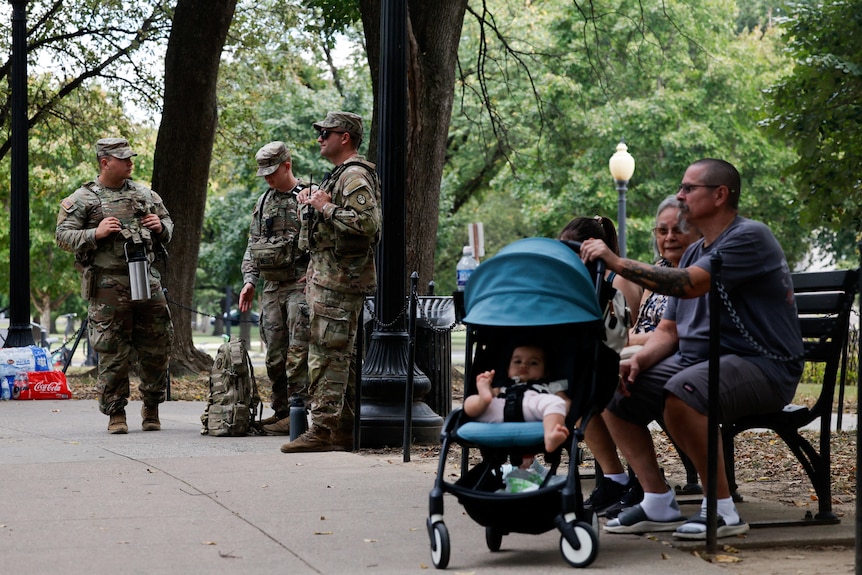 Members of the US National Guard keep watch at the National Mall