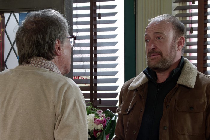 Mal talks to Roy in the cafe, in a scene from Coronation Street
