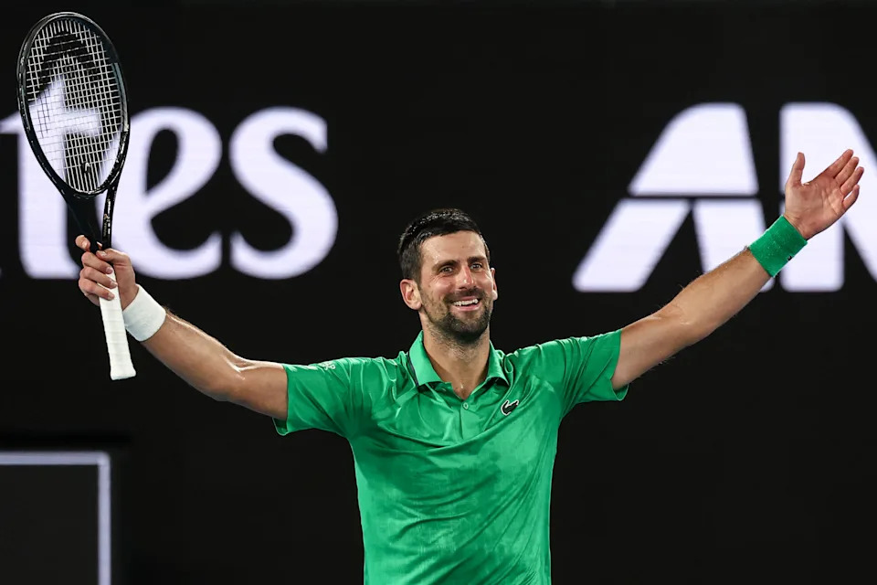 Novak Djokovic celebrates victory over Jannik Sinner.