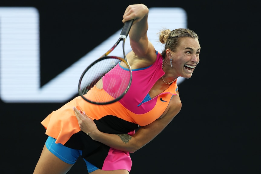 Aryna Sabalenka serves at Australian Open.