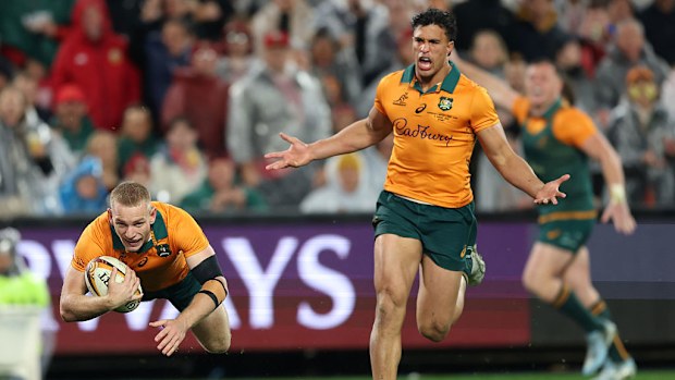 Max Jorgensen of the Wallabies dives over to score a try.