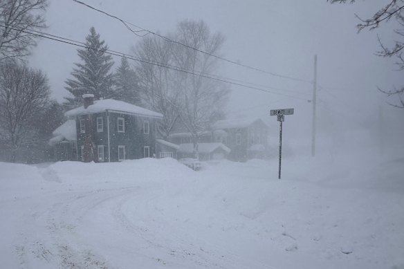 Strong winds kick up snow in Lowville, New York, on Friday