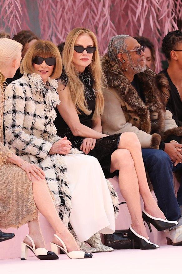 Nicole Kidman seated next to Anna Wintour (talking to Tilda Swinton) at the Chanel haute couture show in Paris.