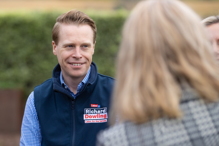 Richard Dowling talking to people.