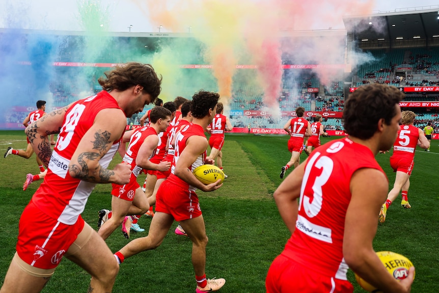 Sydney players run out ahead of Pride colours