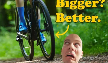 Hapless cycling journo being crushed by gigantic gravel bike with overlaid text reading 'Bigger? Better.'