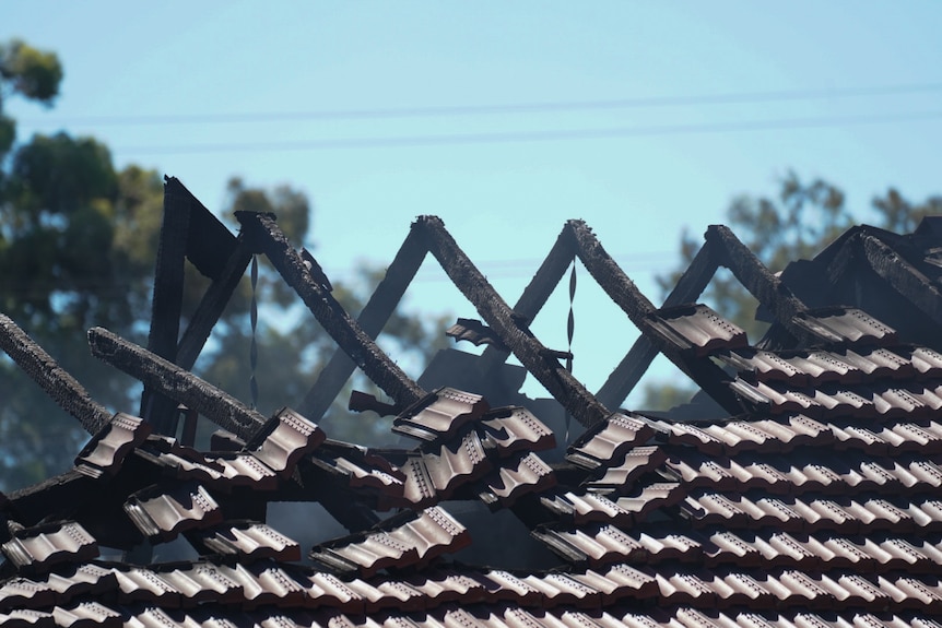 Close up of a roof that was burnt in a fire.