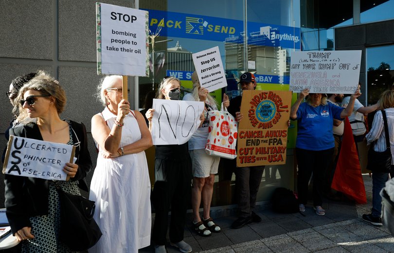 A group of protesters gather outside the US Consulate on St Georges Terrace in the city. Picture: Sandra Jackson