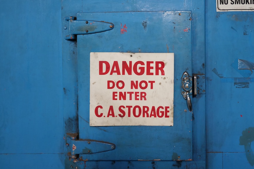Pictures of a door with a big sign that says "DANGER DO NOT ENTER. C.A. Storage"