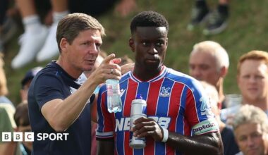 Marc Guehi and Oliver Glasner manager sat side by side during a media conference ahead of the Conference League match between Dynamo Kyiv and Crystal Palace in October.
