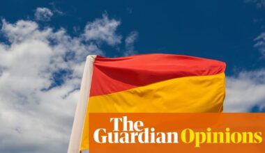 Australia’s red and yellow beach flags can dangerously confuse tourists. Is it time to change them? | Swimming