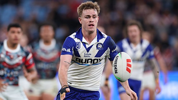 Lachlan Galvin of the Bulldogs passes the ball.