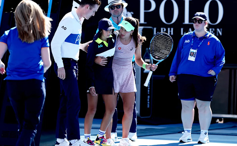 Zeynep Sonmez, pictured here assisting the ball kid after she fainted.