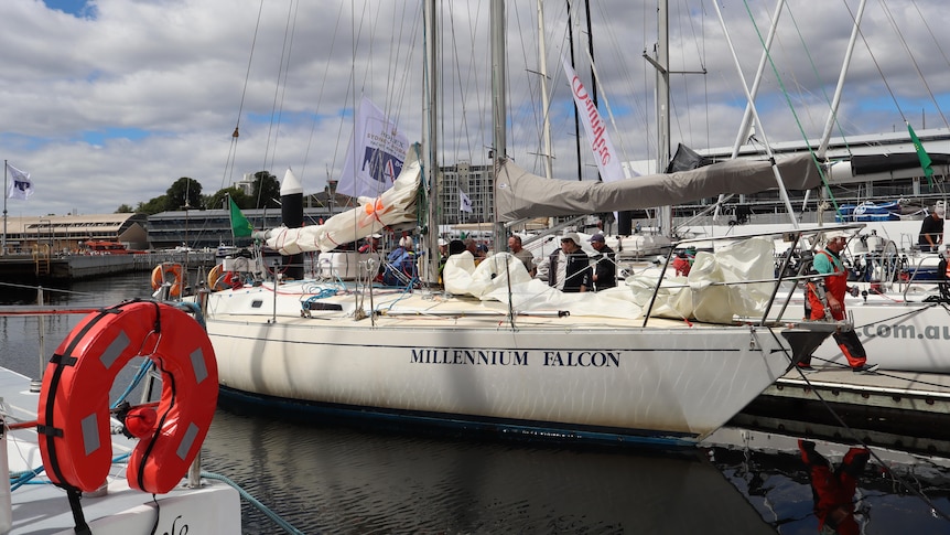 The crew on board Millennium Falcon boat docked in Hobart after finishing the Sydney to Hobart race.