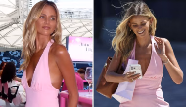AFL WAG Kellie Finlayson turns heads in plunging pink at Pink Test