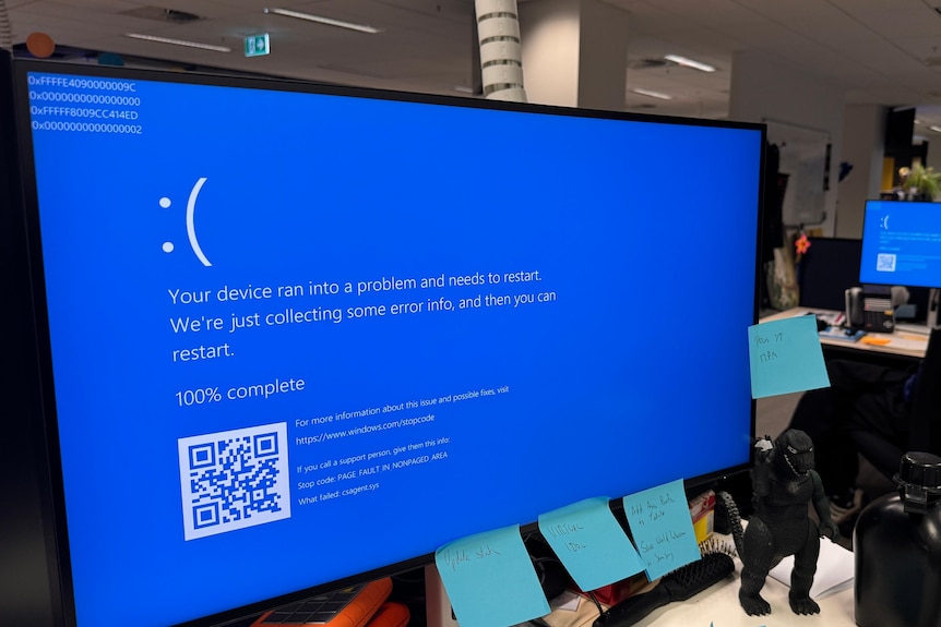 A Windows PC shwing a "Blue Screen of Death" error.