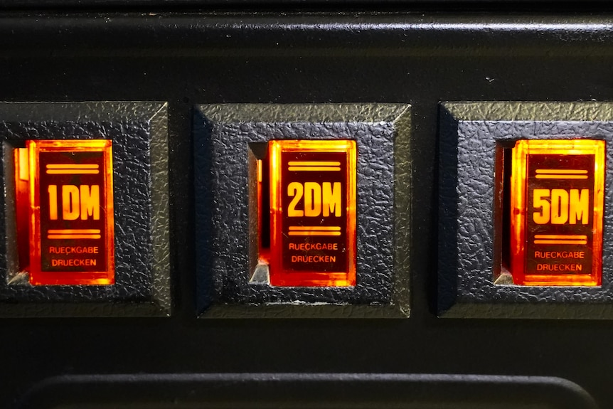 Coin slots with German writing. 