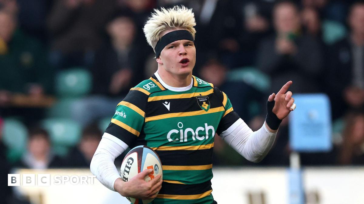 Henry Pollock celebrates on his way to scoring a try for Northampton