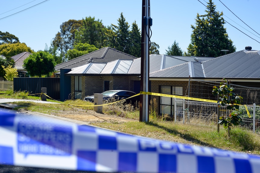 Crime scene tape at Redwood Park.