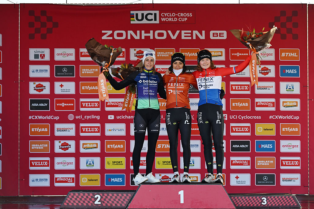 ZONHOVEN, BELGIUM - JANUARY 04: (L-R) Lucinda Brand of the Netherlands and Team Baloise Glowi Lions on second place, race winner Ceylin Alvarado of the Netherlands and Team Fenix-Deceuninck and Puck Pieterse of the Netherlands and Team Fenix-Deceuninck on third place pose on the podium ceremony after the 29th Zonhoven UCI Cyclo-Cross Worldcup 2026, Women&amp;apos;s Elite on January 04, 2026 in Zonhoven, Belgium. (Photo by Luc Claessen/Getty Images)