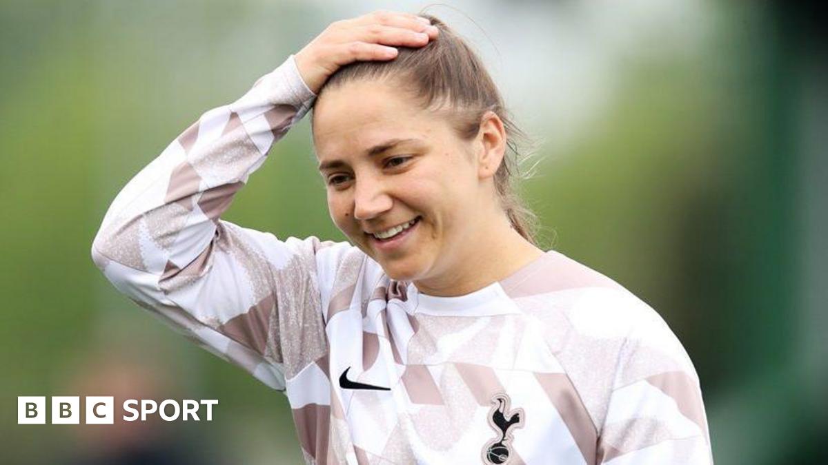Kit Graham, with right hand on her head, during a Tottenham training session