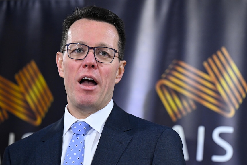 Kieren Perkins speaks during a press conference 