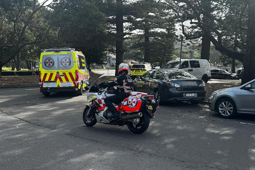 Ambulance and paramedics at the scene of the shark mauling.